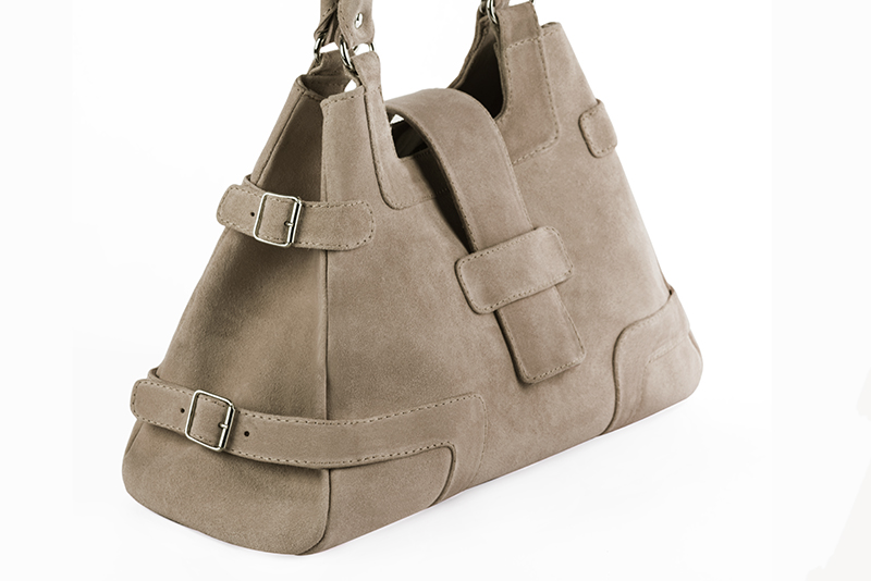 Handcrafted women's luxurious elegant handbag in premium tan beige leather. Perfect for elevated everyday style.   
                Choose from our luxurious collections of leather and fabric to perfectly match your handbags to your outfits.